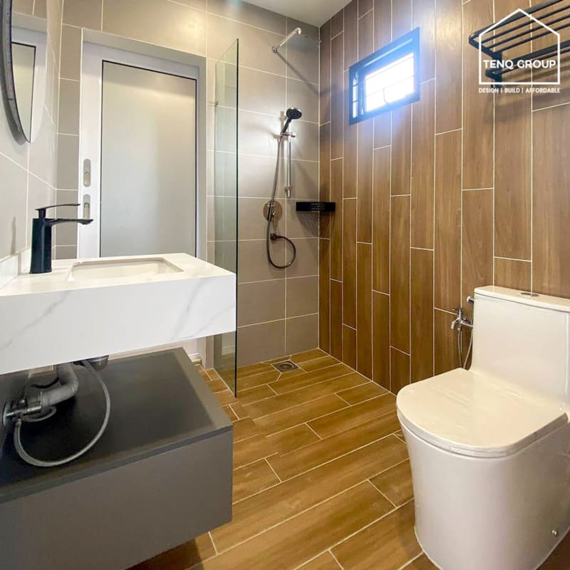 Expand the bathroom space with storage and sliding door access